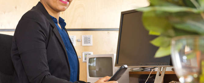 Building security guard at the front desk of a commercial building