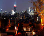 Thompson Hotel Rooftop at Dusk in NYC Empire State Building in Background
