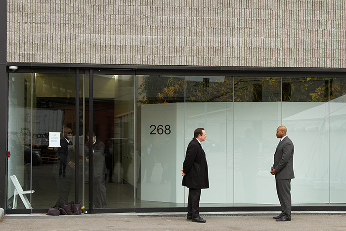 Commercial Building Security guards in front of an office building