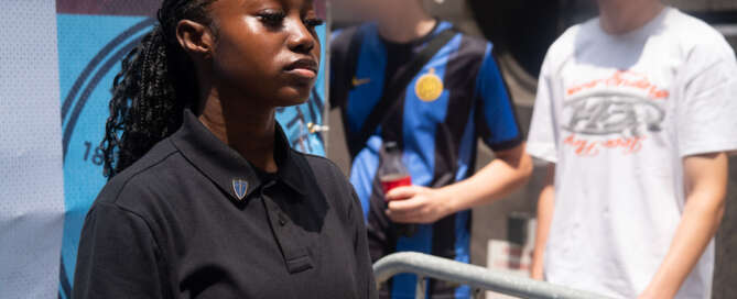 Security Guard manning barricades at an event