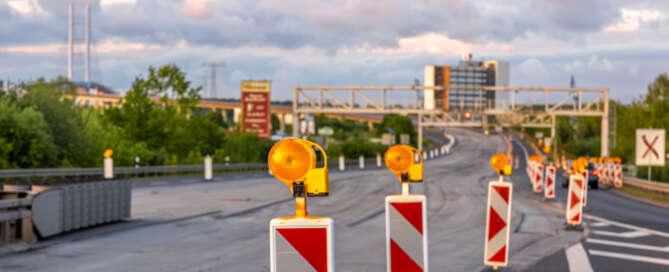 Security bollards and vehicle access barriers at a restricted entrance